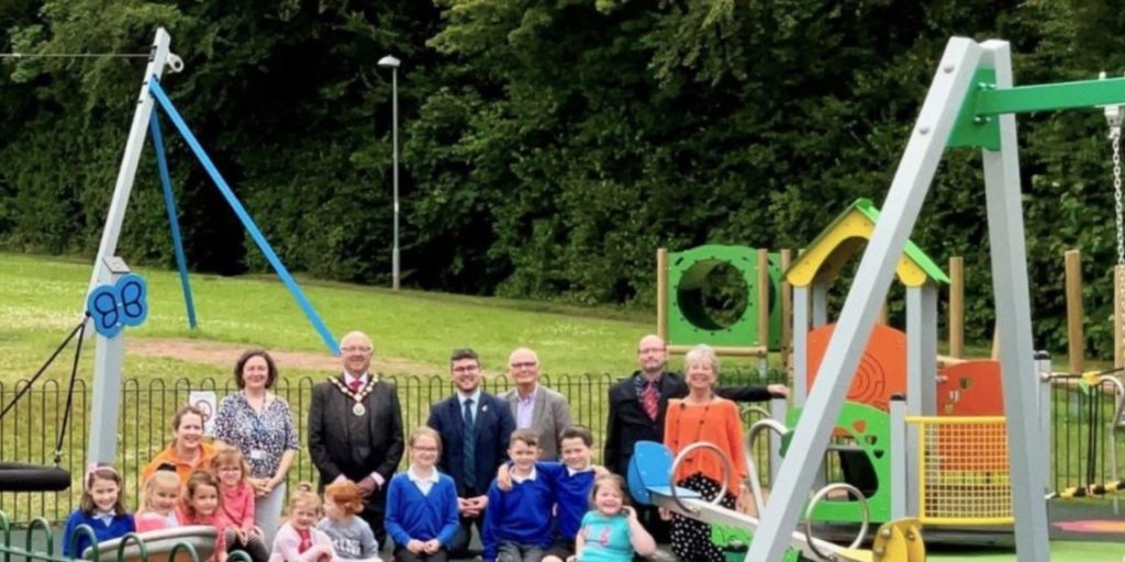 Children and adults at the opening of the new play park in Brecon.